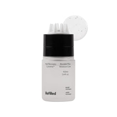 Refilled Booster Plus Moisture bottle with built-in massager for easy scalp care and fast absorption.