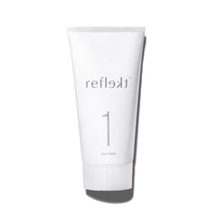 REFLEKT 1 daily exfoliating face wash bottle demonstrates gentle cleansing for clear pores.