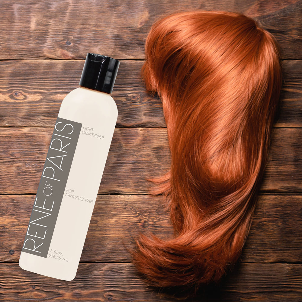 Rene of Paris conditioner preserves natural look of synthetic wigs.