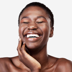 Texture close-up showing silky serum texture by Replenix Retinol 5X.
