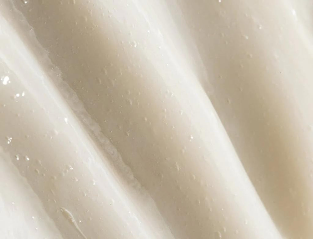 REVERIE Natural Milk Anti-Frizz Leave-In pump-dispense for easy application and hydration