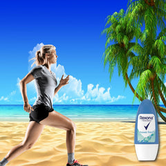 Rexona Shower Fresh bottle close-up during application highlights quick dry formula.