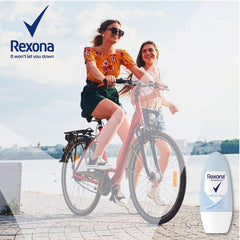 Rexona Women Cotton Dry roll-on held in hand for daily protection.