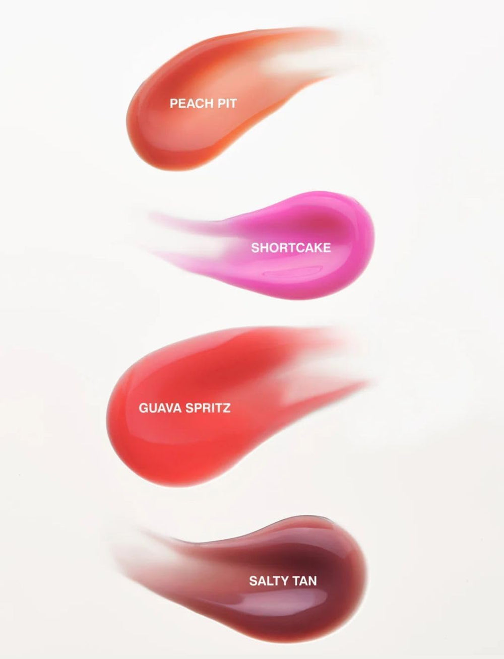 Highlighting hydration as Rhode Gloss Lip Tint Toast nourishes lips