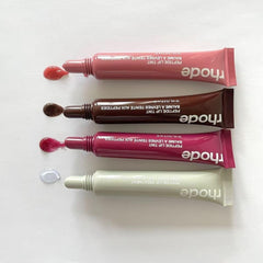 Lifestyle shot of Rhode Gloss Lip Tint Toast for everyday gloss