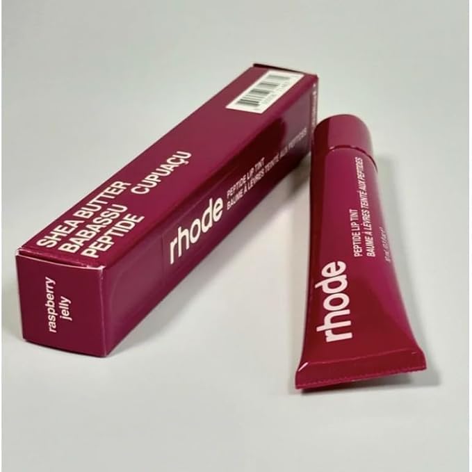 Rhode Raspberry Lip Tint swatch displaying sheer color and hydration for everyday wear.