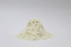 Rice Essence Kojic Acid Powder close-up reveals fine, silky powder for formulations.