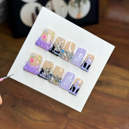RIICFDD 10-piece handmade press-on nails kit with medium duck design for quick manicures.