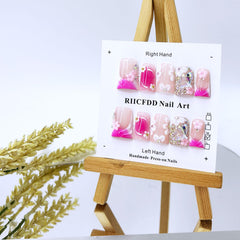 RIICFDD nails featuring 3D flower design for elegant rose-pink style.