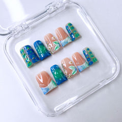 RIICFDD nails with a droplet pattern ready for quick, durable wear.