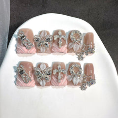 RIICFDD luxury duck press-on nails with butterfly rhinestones for instant glam.