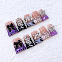 RIICFDD luxury rhinestones on full-cover nails for a shimmering finish.