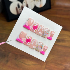 RIICFDD medium duck press-on nails with butterfly rhinestones for rose-pink look, durable finish.