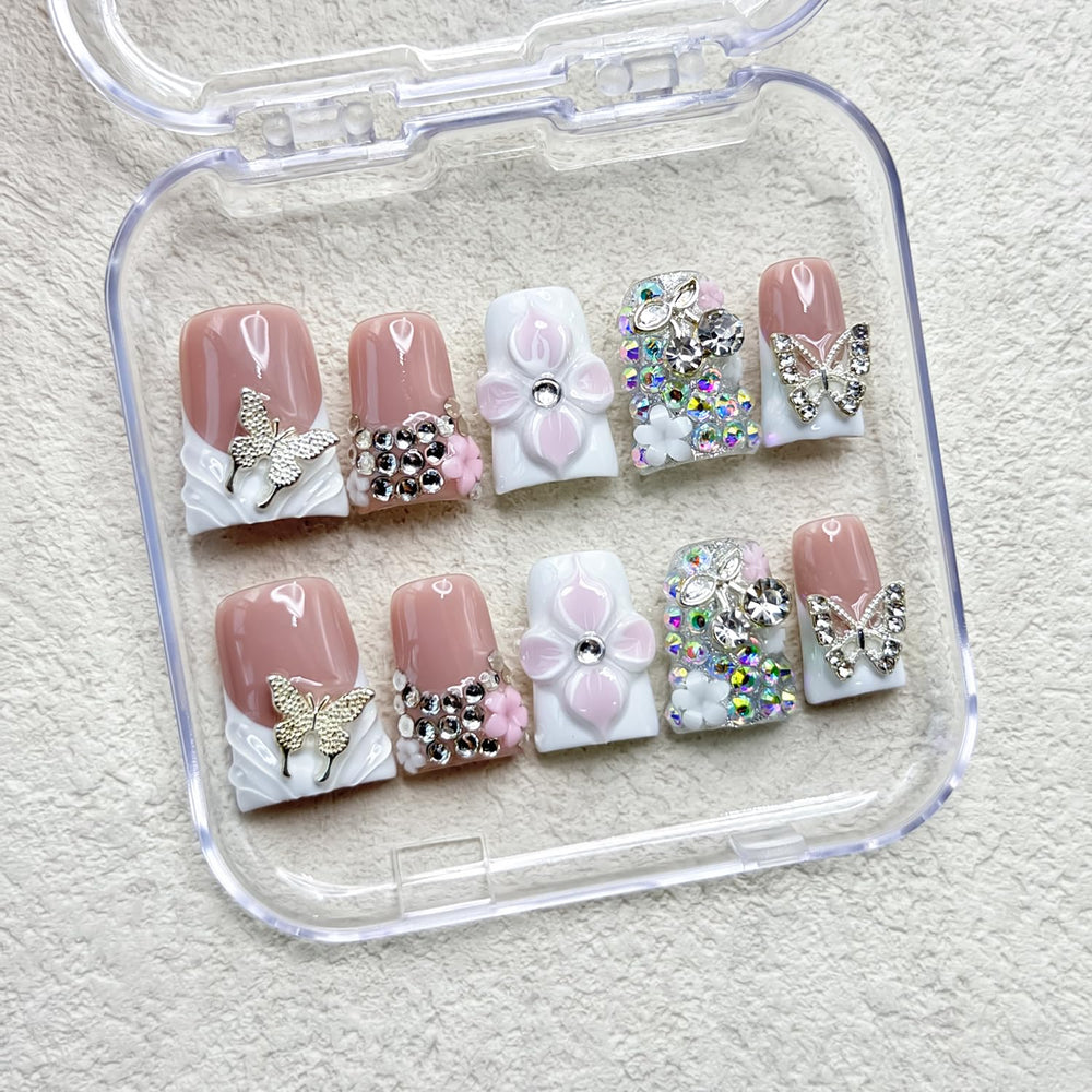 RIICFDD rhinestone butterfly design nails add sparkle for events.