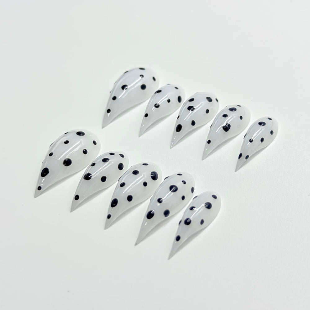 RIICFDD white stiletto nails with curved edges for natural look.