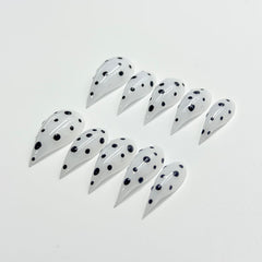 RIICFDD white stiletto nails with curved edges for natural look.