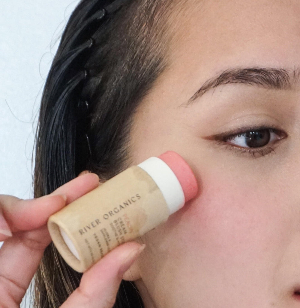 River Organics Peachy blush on lips for a subtle pop of color.