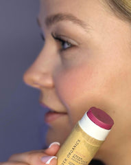 River Organics blush stick swatch on forearm showing buildable color.