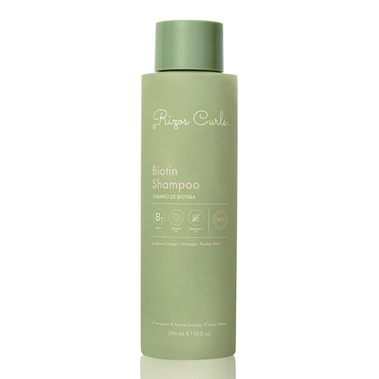 Rizos Curls Biotin Shampoo bottle-front highlights sulfate-free formula for all hair types.