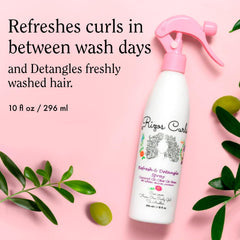 Rizos Curls Travel Refresh & Detangle Spray being applied on dry hair to revive curls.