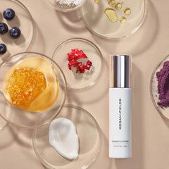 Rodan + Fields Radiant Defense application smoothed on skin highlights seamless blend and dewy finish.