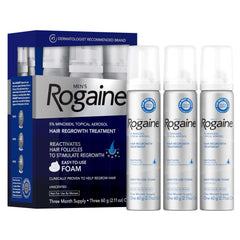 Rogaine men’s 5% foam bottle for at-home hair regrowth treatment.