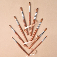 Rolabling nail brush round-head design eases nail art detailing.