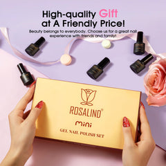 ROSALIND dark-glitter tones on nails showcase dramatic festive shine.