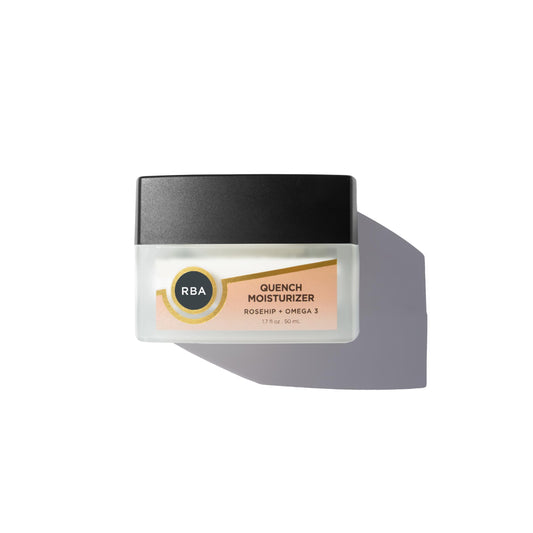 Round Barn Apothecary Quench bottle shows vegan daily moisturizer for hydrated skin.