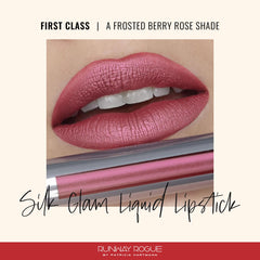 Runway Rogue First Class shade swatch on lips reveals frosted berry-rose glow.