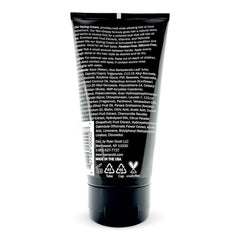 Close-up of hair being styled with Ryan Scott RS cream to tame frizz.