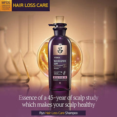 Ryo Hair Strength Expert Care Shampoo bottle on shelf in a clean bathroom setting.
