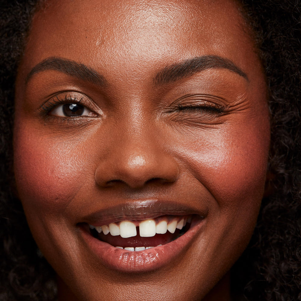 Saie Dew Liquid Blush swatch highlights a lightweight, hydrating formula.