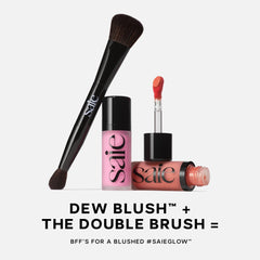 Saie Dew Liquid Blush natural flush appearance on bare skin.