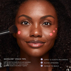 Saie Dew Liquid Blush Trio Spicy swatch delivers warm terracotta warmth.