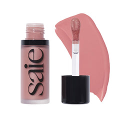 Saie Dew Liquid Blush wand application for precise, natural color on the cheeks.