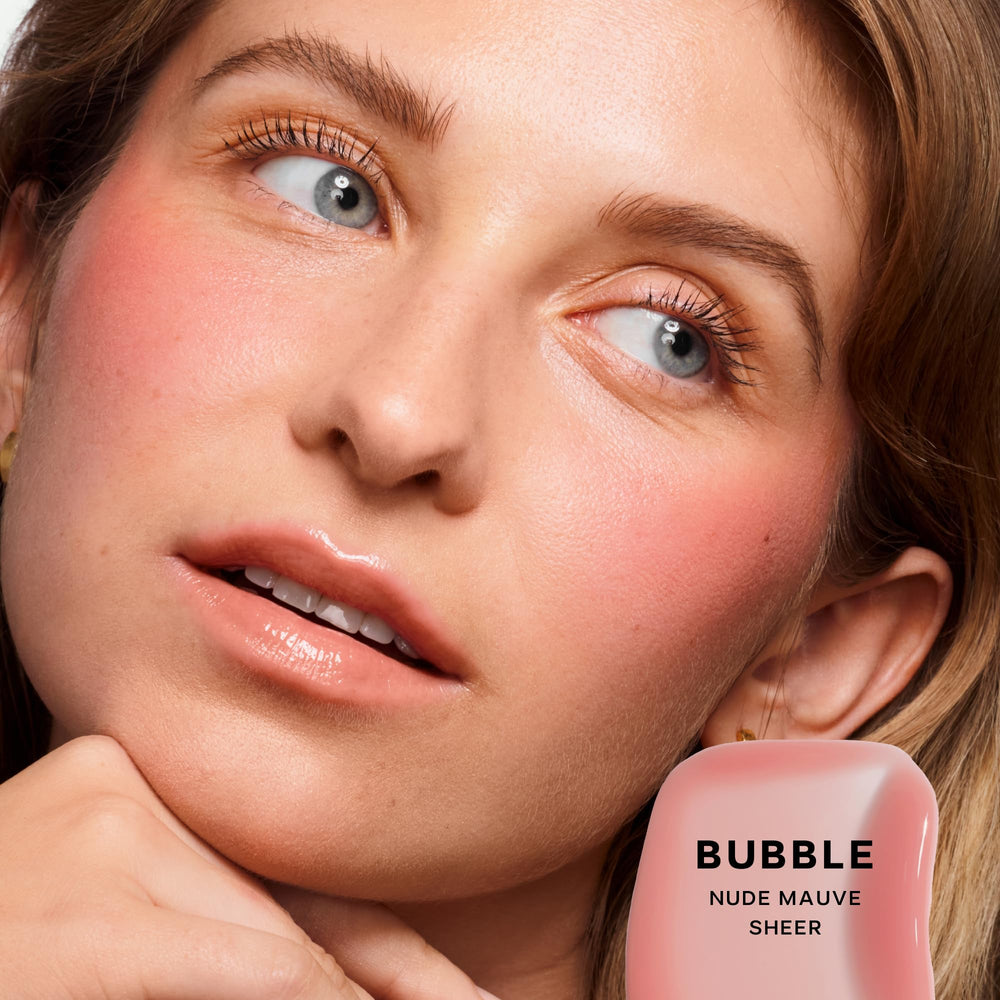 Saie Glossybounce Bubble applicator dots for precise, buildable color.