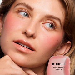 Saie Glossybounce Bubble applicator dots for precise, buildable color.
