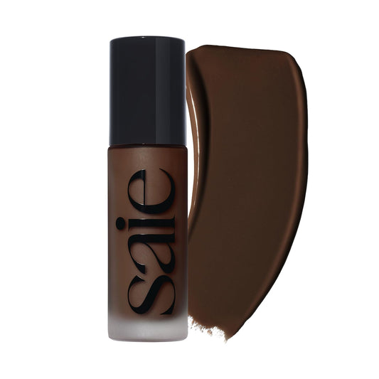 Saie Glowy Super Skin Tint bottle demonstrating weightless, dewy finish for daily wear