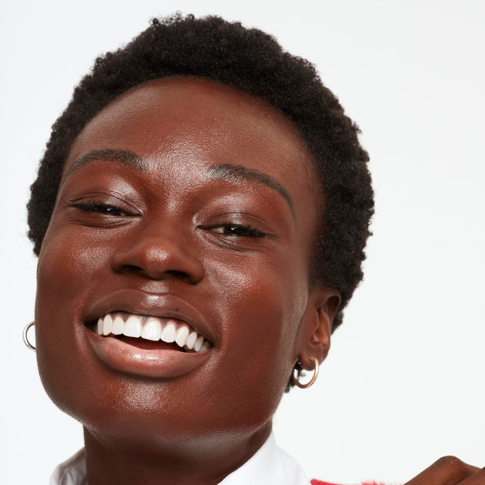 Saie Glowy Super Skin Tint on hand shows easy blend.