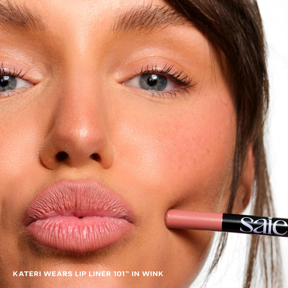 Saie Lip Liner 101 shea butter jojoba oil nourishes lips during lining.