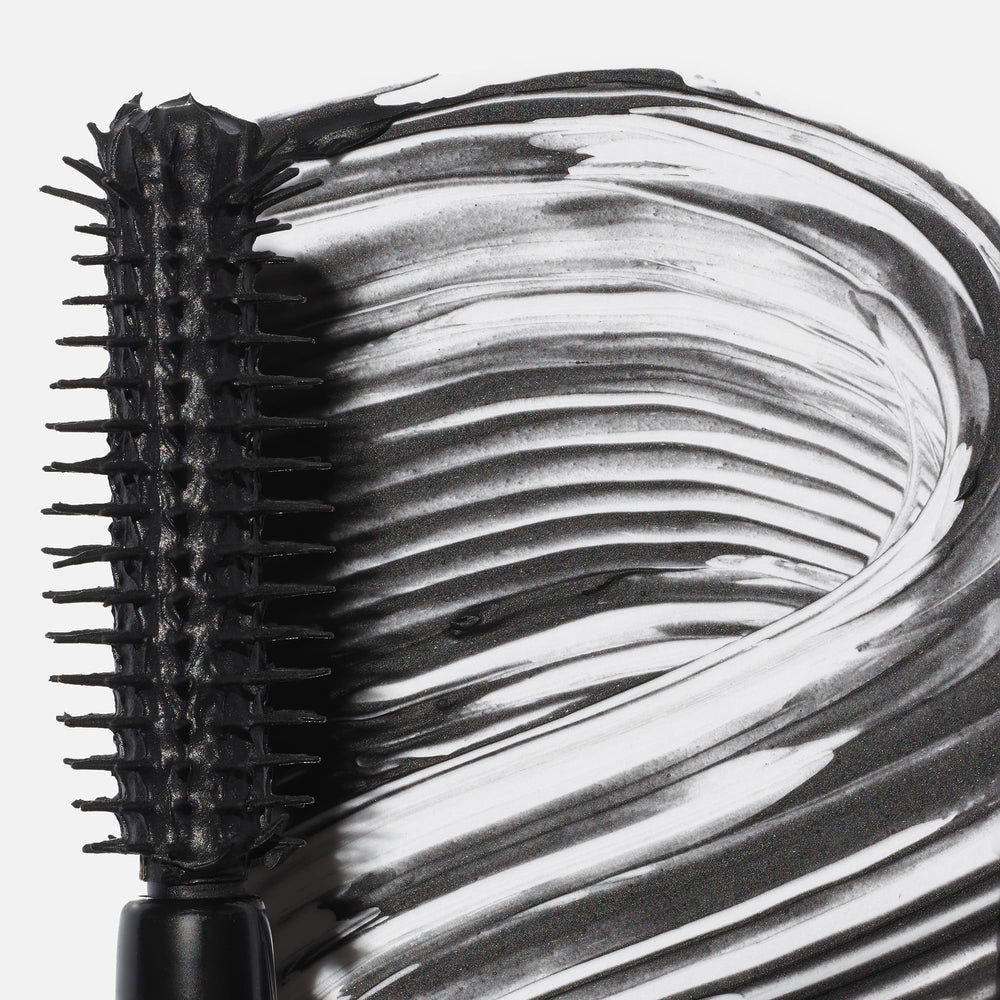 Saie Mini Mascara101 extended lashes with buildable drama for day-to-night wear.