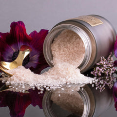 SAINT JANE bath-salts in tub scene suggests spa-like relaxation at home