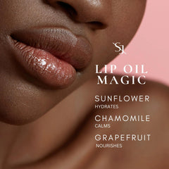 SAINT JANE Nectar lip oil on lips with golden peach glow and slip