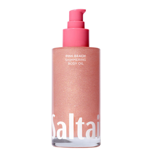 Saltair Shimmering Body Oil pink beach bottle shows glow and hydration