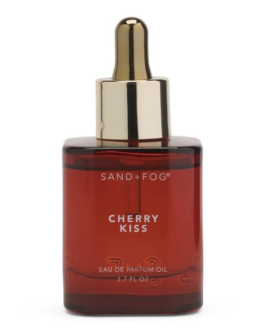 Sand and Fog Cherry Kiss fragrance dropper bottle, bold evening wear and lasting allure.
