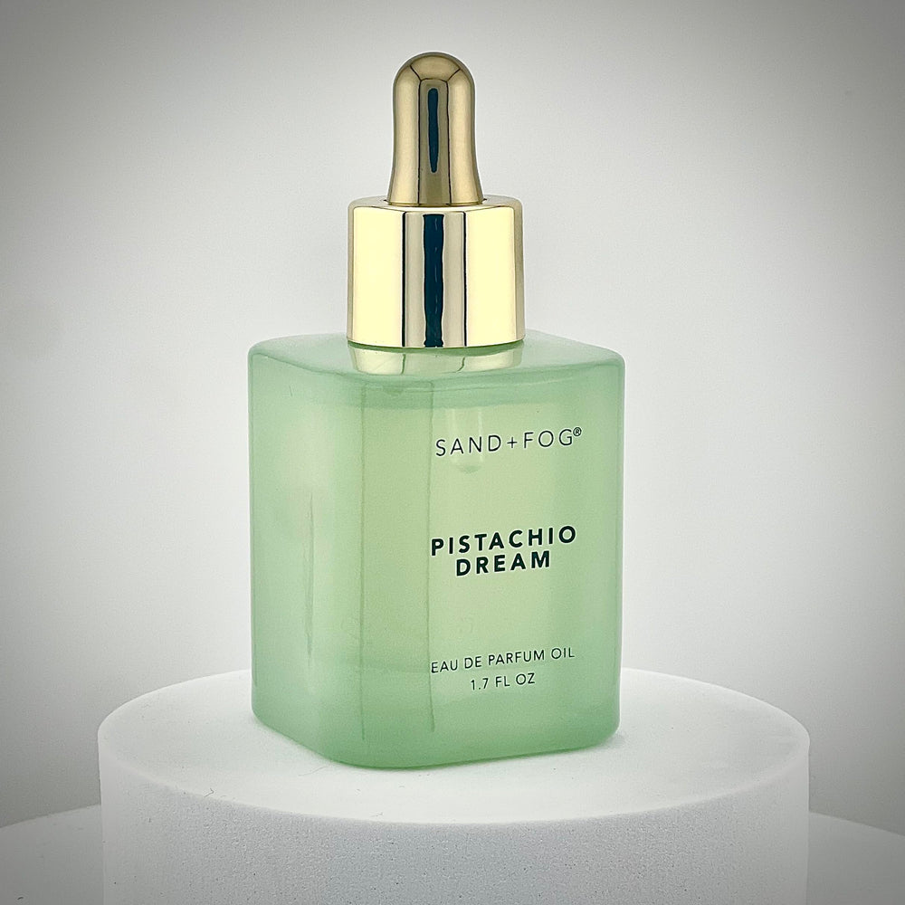 Sand + Fog Pistachio Dream dropper in use for precise, minimal waste fragrance application