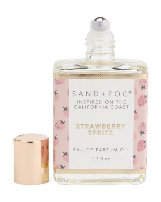 Sand + Fog Strawberry Spritz rollerball, portable design for travel-friendly application.