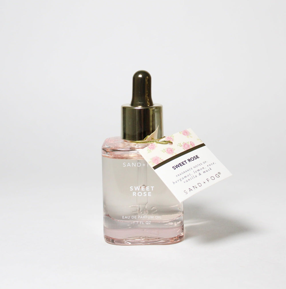 Sand and Fog Sweet Rose perfume oil bottle with dropper for precise, long-lasting fragrance