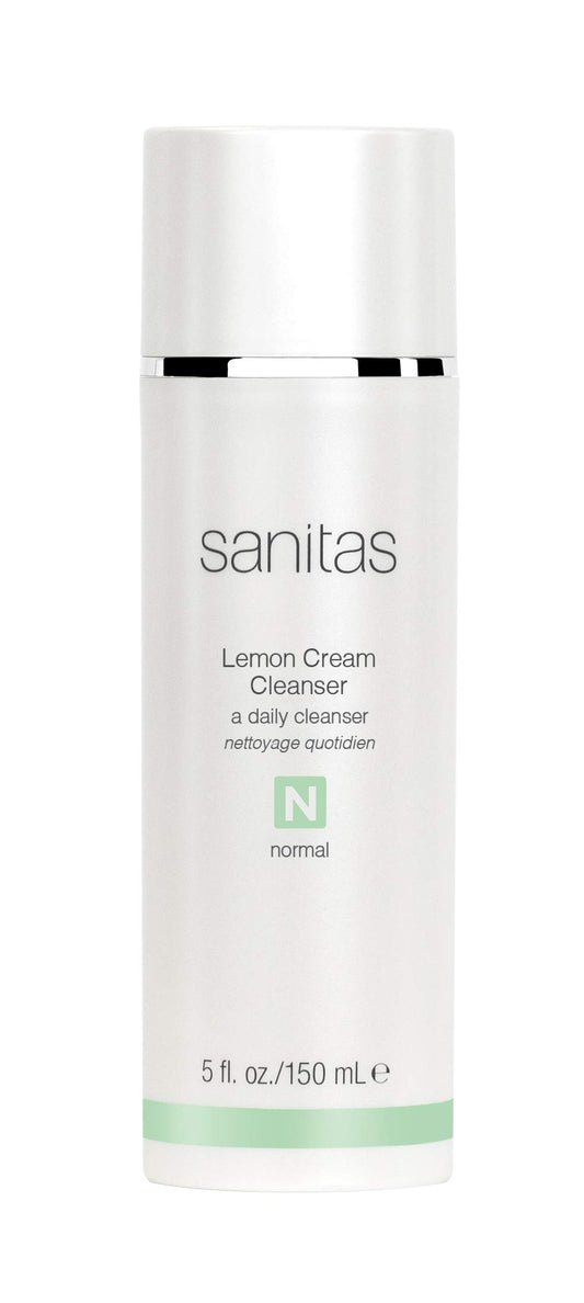 Sanitas Lemon Cream Cleanser bottle with bright citrus glow for daily cleansing.